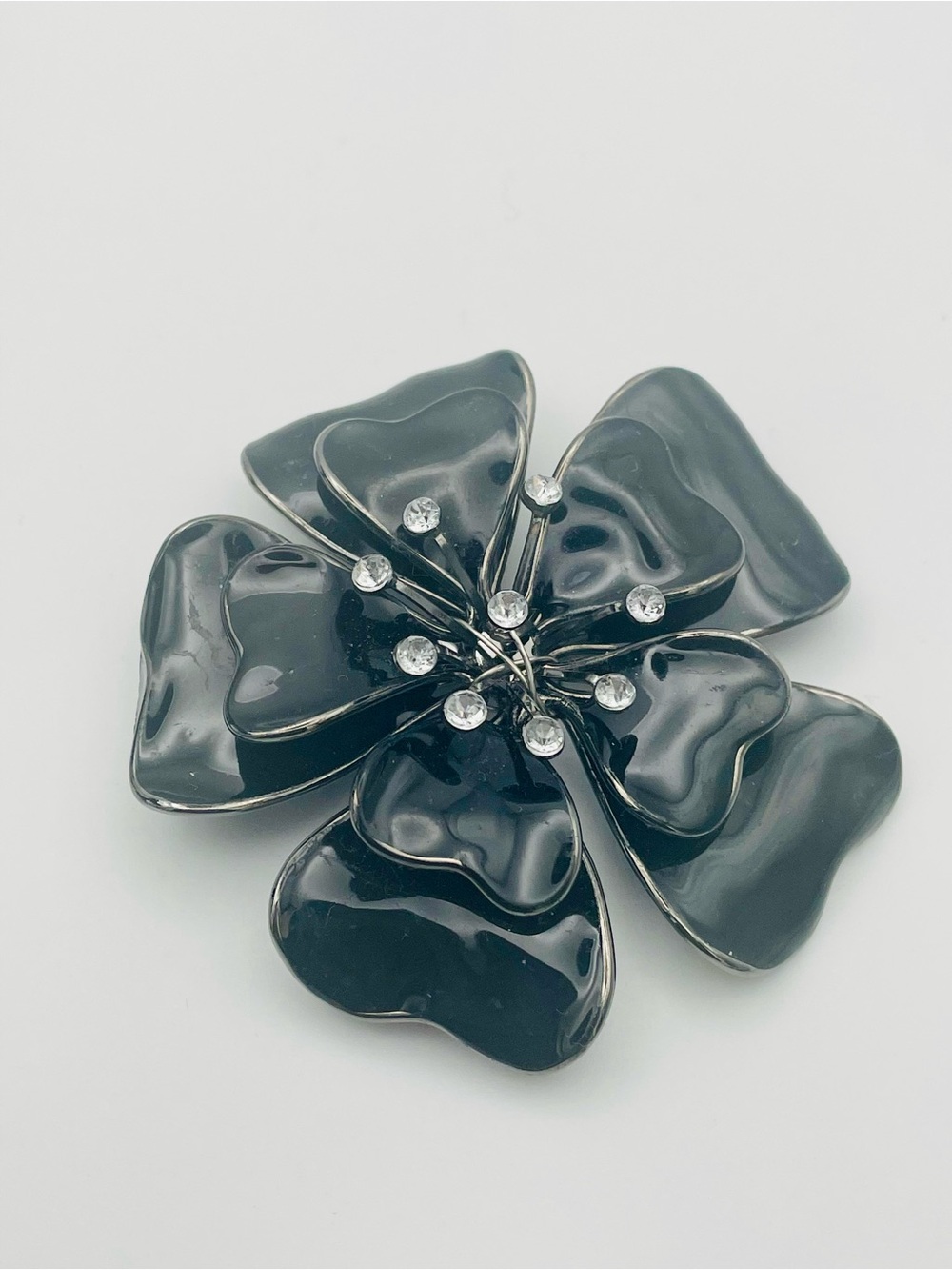 Vintage Black Enamel Flower Brooch with Crystal Rhinestone Accents